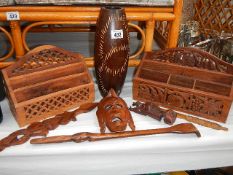 8 assorted wooden items including letter racks, mask, back scratcher etc.