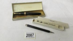 A boxed Conway Stewart fountain pen with 14ct nib and an unmarked propelling pencil in Conway
