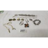 A mixed lot of jewellery including early 20th century Scottish hard stone brooch, silver bracelet,