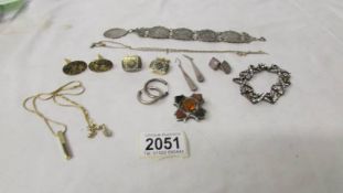 A mixed lot of jewellery including early 20th century Scottish hard stone brooch, silver bracelet,