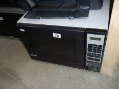 A Thorn microwave oven in working order.
