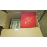 A box of various music books including Mozart.