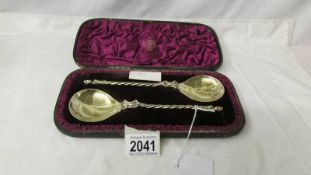 A cased pair of hall marked silver gilt apostle spoons, circa 1883.