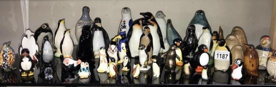 A large selection of penguin ornaments