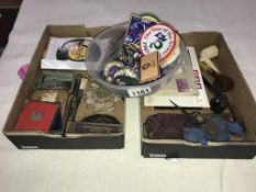 A box of miscellaneous items including pipes, Beatles trade cards, beer mats & scout badges etc.