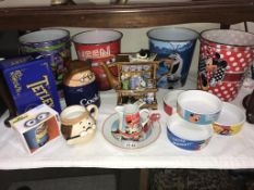 A quantity of promo stand kitchen ware including Tetley & Disney etc.