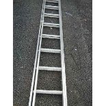 An aluminium double ladder.