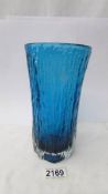 A Geoffrey Baxter Whitefriars glass textured vase in kingfisher blue, circa 1974.