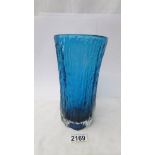 A Geoffrey Baxter Whitefriars glass textured vase in kingfisher blue, circa 1974.