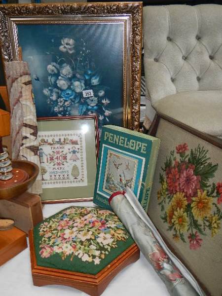 A foot stool with embroidered top, tray, screen and other embroidered items.