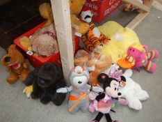 A mixed lot of soft toys.