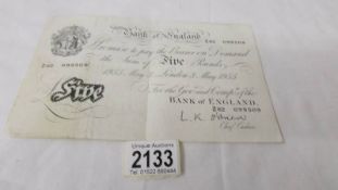 A Bank of England white £5 note dated 3 May 1955, No. Z62 099509, L K O'Brien.