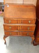 An early 20th century oak bureau.