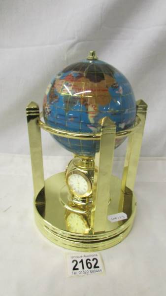 An Osborne & Allen Ltd., revolving globe incorporating a 4 way clock, needs battery. - Image 3 of 3