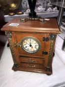 A clock faced jewellery cabinet