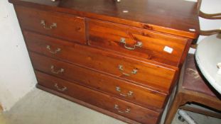 A mahogany 2 over 3 chest of drawers.