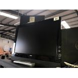 A working Goodmans 19" TV with remote