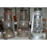 Three old Tilly lamps.