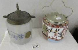 An oriental style biscuit barrel and an unusual frosted glass biscuit barrel.