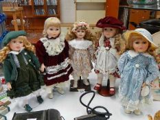 5 porcelain collector's dolls.