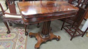 A good quality Victorian rosewood fold over tea table.