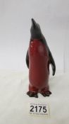 A Royal Doulton Flambe' penguin.