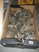 A box of horse stirrups.