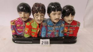 A prototype by J M ? of the Beatles dressed in Sgt Pepper jackets a/f (hairline crack to front of
