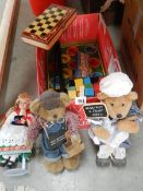 A box of vintage games, dolls etc.