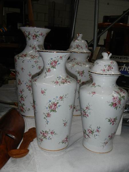 Four good floral decorated vases.