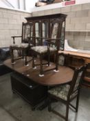 A good oak table and 6 chairs height 74cm,