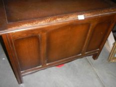 An oak blanket box.