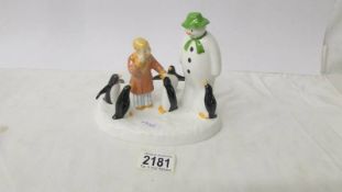 A Royal Doulton 'The Snowman, Penguin Pals' figure group.