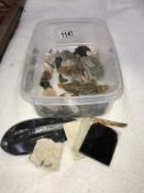 A box containing Neolithic flint tools, piece of amber & fossils, some identified, dinosaur shell,