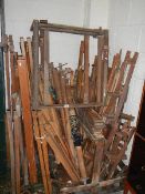 A large quantity of weaving loom parts.