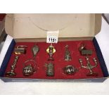 A vintage box set of brass miniatures of gramophone, oil lamp & violin bellows etc.