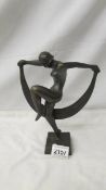 A contemporary bronze figure of a nude dancer, 24 cm tall.