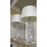 A pair of good quality modern table lamps with shades.