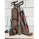 A good lot of hand pumps, foot pumps, oil cans etc.