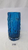 A Geoffrey Baxter Whitefriars glass cylindrical bark vase in kingfisher blue,