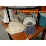 A quantity of lamp shades including new.