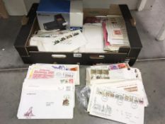 A box containing stamp albums, philatelic mounts, accessories,