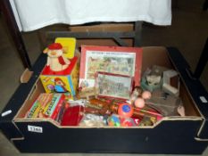 A quantity of vintage toys and games including clockwork cat, jack in box etc.