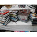 Approximately 60 DVD's etc.