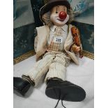 A vintage clown puppet.