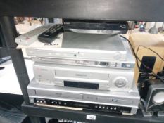 3 DVD players, a Video Plus VCR and a Video.