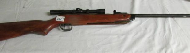 An air rifle with sight.