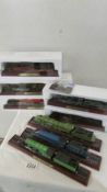 Five boxed and three unboxed model locomotives (ornamental).