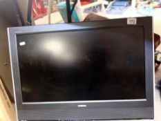 A Toshiba 26" LCD TV with remote