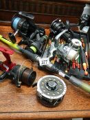 A mixed lot of angling equipment.